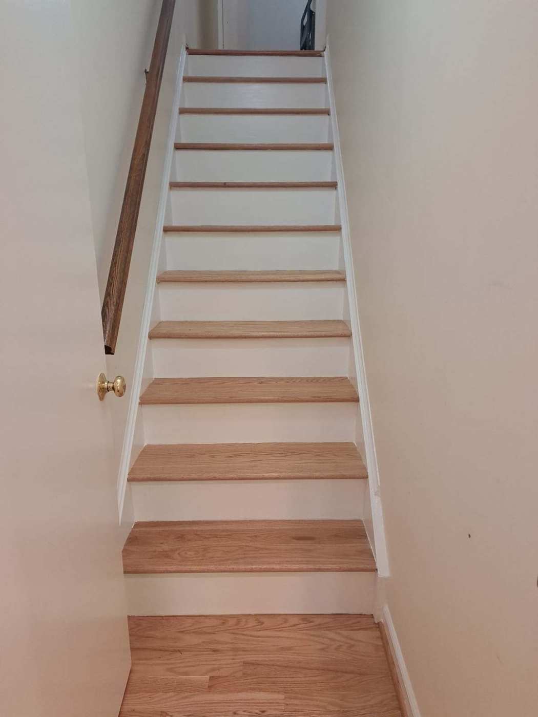 Romero's Home Improvement crew painting and renovating a home interior in Gaithersburg, MD